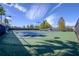 Outdoor community tennis court showcasing well-maintained green and blue surfaces, ready for a match at 12406 Bristol Commons Cir, Tampa, FL 33626