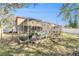 A lovely backyard and screened pool. Features lush landscaping, plenty of room, and a relaxing atmosphere at 12705 Longcrest Dr, Riverview, FL 33579