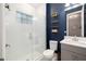 Contemporary bathroom with a glass shower and vanity with a stylish mirror at 12730 Oak Hill Way, Parrish, FL 34219
