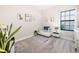 Adorable Bedroom with a crib, neutral colors, and ample natural light at 12730 Oak Hill Way, Parrish, FL 34219