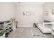 Inviting Bedroom with crib, toy storage, and decorative wall art at 12730 Oak Hill Way, Parrish, FL 34219