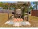 A charming backyard patio with a pergola covered in climbing plants, perfect for outdoor dining and entertaining at 13191 Siam Dr, Spring Hill, FL 34609