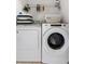 Efficient laundry area equipped with a modern washer and dryer set at 13191 Siam Dr, Spring Hill, FL 34609