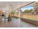 Relaxing screened patio providing a seamless transition to the outdoors at 13191 Siam Dr, Spring Hill, FL 34609