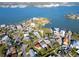 Stunning aerial view of the property's desirable waterfront community, showcasing its location near the water at 15822 Redington Dr, Redington Beach, FL 33708