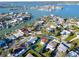 Stunning aerial view of the property's desirable waterfront community, showcasing its location near the water at 15822 Redington Dr, Redington Beach, FL 33708