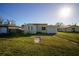 Charming single-story home featuring a well-manicured lawn and attached garage, perfect for easy living at 15822 Redington Dr, Redington Beach, FL 33708
