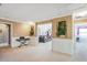 Bright bonus room with white walls and trim, carpet flooring, and versatile space for varied activities at 20427 Carolina Cherry Ct, Tampa, FL 33647