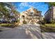 Beautiful two-story house with attached two-car garage and well-kept front yard at 20427 Carolina Cherry Ct, Tampa, FL 33647