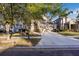 Charming two-story home featuring a well-manicured lawn and a spacious two-car garage at 20427 Carolina Cherry Ct, Tampa, FL 33647