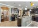 Well-equipped kitchen featuring granite countertops, stainless steel appliances, and ample cabinet space at 20427 Carolina Cherry Ct, Tampa, FL 33647