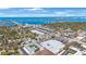 Aerial view of the condominium, showcasing its location near the bay, city, and local amenities at 215 Valencia Blvd # 205, Belleair Bluffs, FL 33770