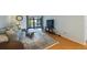 Comfortable living room with access to an outdoor balcony at 215 Valencia Blvd # 205, Belleair Bluffs, FL 33770