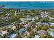 Aerial view of the property showcasing its location, layout, and nearby waterfront at 217 Manatee Rd, Belleair, FL 33756
