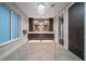 Contemporary bathroom with dual sinks, modern fixtures, and a spacious, glass-enclosed shower at 217 Manatee Rd, Belleair, FL 33756