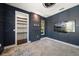 Stylish bonus room features custom millwork, open shelving, and large walk-in closet space at 217 Manatee Rd, Belleair, FL 33756