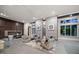 Expansive living room offering flexible seating areas, stylish decor, and abundant natural light at 217 Manatee Rd, Belleair, FL 33756