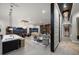 Expansive open-concept living area with elegant decor, fireplace, and seamless flow to dining and kitchen spaces at 217 Manatee Rd, Belleair, FL 33756