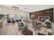 Open living space with decorative lighting, large windows, and stylish modern decor at 217 Manatee Rd, Belleair, FL 33756