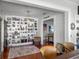 Inviting living room with custom built-in shelving and an open floor plan at 235 Aberdeen St, Dunedin, FL 34698