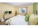 Bedroom features plush carpet, decor, and a peaceful atmosphere at 2749 Countryside Blvd # 28, Clearwater, FL 33761