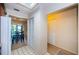 Cozy dining area with white tile floors, leading to the kitchen and outdoor patio at 2749 Countryside Blvd # 28, Clearwater, FL 33761