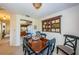 Dining room showcasing decor shelf with kitchen and hallway views, promoting seamless transitions at 2749 Countryside Blvd # 28, Clearwater, FL 33761