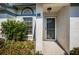 Inviting entryway featuring well-maintained landscaping and clear house number at 2749 Countryside Blvd # 28, Clearwater, FL 33761