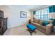 Cozy living room with comfortable seating and natural light at 2749 Countryside Blvd # 28, Clearwater, FL 33761