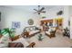 Open-concept living room flowing into the kitchen area at 2749 Countryside Blvd # 28, Clearwater, FL 33761