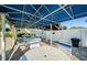 Charming poolside pavilion, perfect for outdoor gatherings, dining, and relaxation in a serene setting at 2749 Countryside Blvd # 28, Clearwater, FL 33761