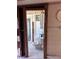 View through a doorway, into a bathroom featuring a toilet, sink and shower with shower curtain at 3001 57Th S St, Gulfport, FL 33707