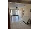 Dining room featuring tile flooring, table and a view of the backyard at 3001 57Th S St, Gulfport, FL 33707