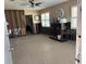 Living room with damage and a ceiling fan at 3001 57Th S St, Gulfport, FL 33707
