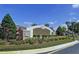 The Larkenheath neighborhood entrance sign is surrounded by manicured shrubbery, trees, and a nicely maintained landscape at 31818 Blythewood Way, Wesley Chapel, FL 33543