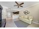 Comfortable living room with adjacent kitchen area at 36750 Us Highway 19 N # 3-210, Palm Harbor, FL 34684