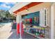 Pool shop with clothing, souvenirs, and drinks available for purchase with view of children and water feature at 36750 Us Highway 19 N # 3-210, Palm Harbor, FL 34684