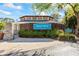 Loch Ness 'monster pool' with ample green space and building in the background at 36750 Us Highway 19 N # 3-210, Palm Harbor, FL 34684