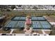 Aerial view of meticulously maintained pickleball courts at this community at 407 Feltham Trl # A, Sun City Center, FL 33573