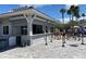 Outdoor poolside bar offering refreshments with tiled accents at 407 Feltham Trl # A, Sun City Center, FL 33573