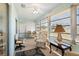 Cozy sunroom with lots of natural light, and relaxing decor at 407 Feltham Trl # A, Sun City Center, FL 33573