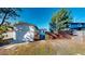 Spacious backyard with a wooden fence and detached garage, perfect for outdoor activities at 4586 12Th N Ave, St Petersburg, FL 33713
