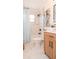 Bathroom featuring light marble tile, modern fixtures, and a shower-tub combo at 4586 12Th N Ave, St Petersburg, FL 33713