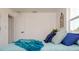 Cozy bedroom featuring an accent wall, natural light, and relaxing furnishings at 4586 12Th N Ave, St Petersburg, FL 33713