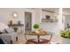 Bright living room featuring modern decor, a glass coffee table, and stylish furnishings at 4586 12Th N Ave, St Petersburg, FL 33713