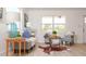 Cozy living area with ample natural light, stylish furniture, and a decorative rug at 4586 12Th N Ave, St Petersburg, FL 33713