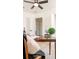Office space with vintage style desk, decorative items, and modern ceiling fan at 4586 12Th N Ave, St Petersburg, FL 33713