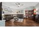 Spacious living room with sectional sofa, wood flooring, and stylish decor at 4821 Barchetta Dr, Land O Lakes, FL 34639