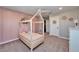 Lovely bedroom featuring a play bed with decorations, pink wall and dresser at 4904 Eagle Rock Dr, Wimauma, FL 33598