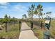 Fenced community dog park providing a designated area for pets to exercise and socialize at 4904 Eagle Rock Dr, Wimauma, FL 33598